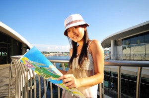 Female Tourist reading her map